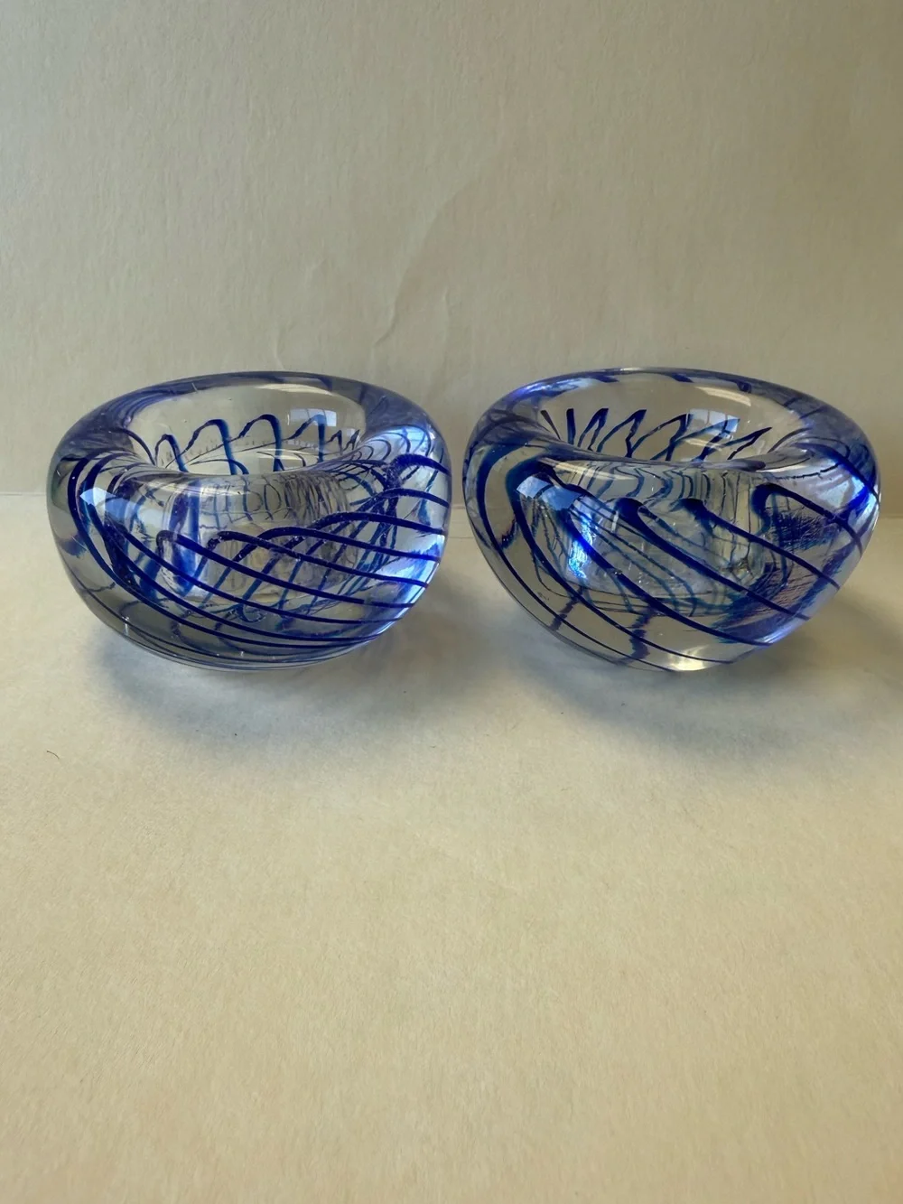 Pair of Handmade Art Glass Paperweight Candle Holders. Clear with Blue Swirl.